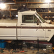 Jeep J10: currently being used to store Jeep XJ parts, wondering when I will find time to fix its trans.